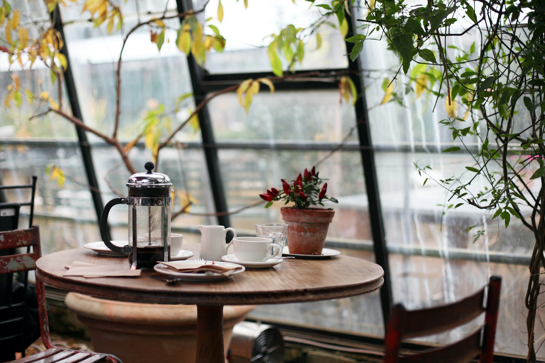 Coffee and pastry served on a warm cafe table